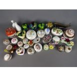 A collection of small ceramic items to include trinket boxes, vases, dishes and similar, comprising,