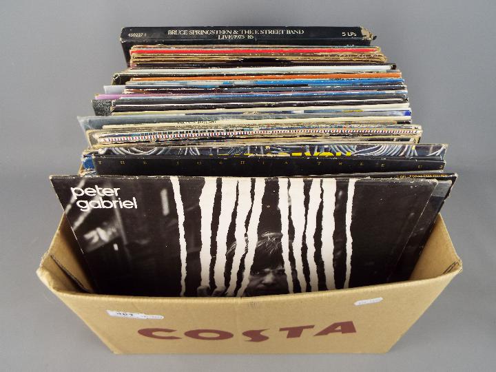 A quantity of 33 RPM vinyl records to include Elvis, The Who, Prince, U2, The Police and similar. - Image 2 of 2