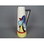 Lorna Bailey - a Lorna Bailey ceramic jug decorated in the Lakeside pattern, approx height 23 cm.