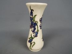 Moorcroft - a Moorcroft vase decorated in the Blue Harmony pattern,