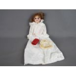 Armand Marseille German bisque doll. Makers mark:1894 AMDEP made in Germany 2/0.