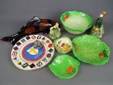 A mixed lot of ceramics to include Carlton Ware, Royal Doulton lady figurines,