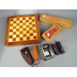 A mixed lot to include a chess set, box of additional Staunton chess pieces, boxed dominoes,
