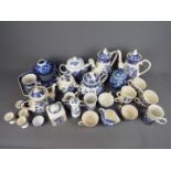 A quantity of blue and white ceramics comprising ginger jars, teapots, coffee pots and similar.