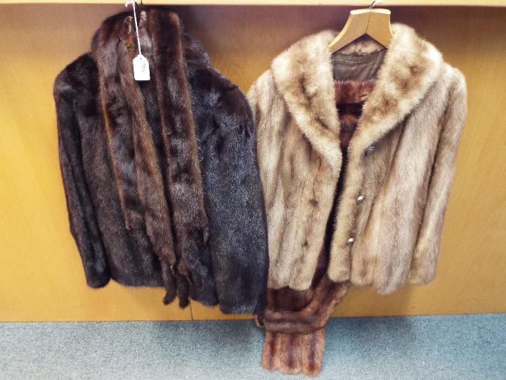 Two fur jackets with stoles.