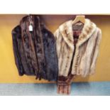 Two fur jackets with stoles.