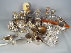 A collection of various plated ware, to include cutlery, candelabra, dressing table items and other.