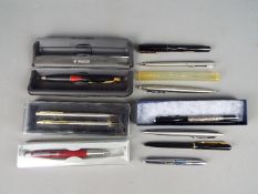 A collection of pens and propelling pencil to include Parker, a Mabie,