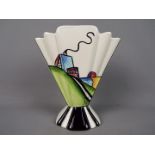 Lorna Bailey - a Lorna Bailey fan vase decorated with an Art Deco style hand painted house,