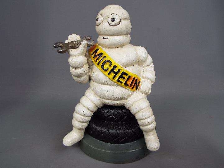 A novelty cast Michelin man,