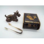 A bronze model depicting a Scottish terrier,