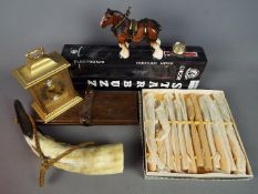 A mixed lot to include a carriage clock, vintage press, ceramic horse, boxed flatware and similar.
