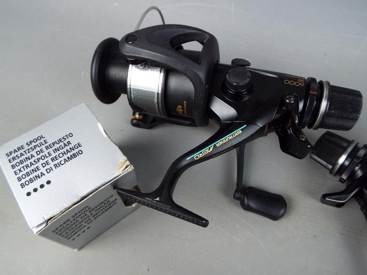 Angling - two new Shimano Big Baitrunner Jero 6000 RE fishing reels with two spare spools and a 12 - Image 4 of 5