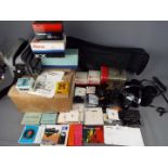 Photography - A Pentax KX camera, additional lenses, tripod,