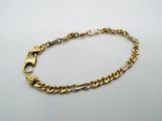 An 18ct yellow gold bracelet (A/F), 19 cm (l), approximately 10.4 grams all in.