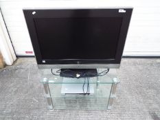 An Hitachi 32" flatscreen television,