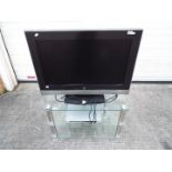 An Hitachi 32" flatscreen television,