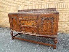 An oak sideboard,