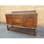 An oak sideboard,