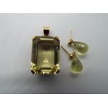 A 9ct gold, stone set pendant, approximately 3.