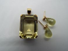 A 9ct gold, stone set pendant, approximately 3.