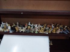 Wade - A collection of Wade Whimsies and similar figures, approximately 80 pieces.