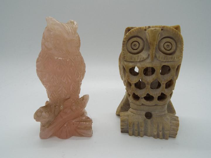 A rose quartz carving depicting an owl and one similar, largest approximately 9 cm (h).