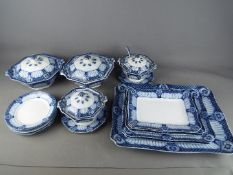 A quantity of Ford & Sons blue and white dinner ware in the Halford pattern, comprising meat plates,