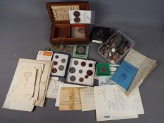 A collection of coins and banknotes to include silver content examples.