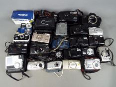 Photography - A collection of cameras to include a Canon EOS650, Fujifilm, Olympus, Sony,