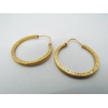 18 ct Gold - a pair of 18ct gold hoop earrings, stamped 750, approximate weight 4.