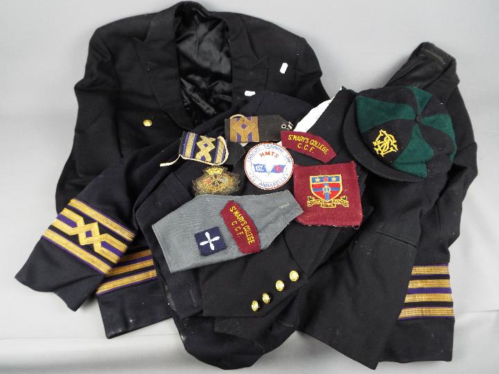 A collection of merchant navy jackets with insignia.