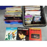 A quantity of vinyl records and CDs comprising classical, Elvis, ABBA and other.