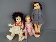 Pedigree Dolls - a collection of three Pedigree dolls to include a girl doll with jointed head,