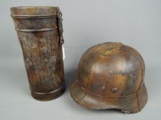 A reproduction or re-enactment prop German World War 2 (WWII) single decal steel helmet,