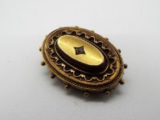 A Victorian 15ct gold mourning locket, Chester assay, approximately 4.6 grams all in.