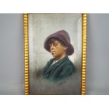 A late 19th century oil on canvas portrait depicting a young boy smoking a cigarette,
