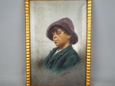 A late 19th century oil on canvas portrait depicting a young boy smoking a cigarette,