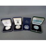 Four silver proof coins of Maltese issue, all encapsulated and contained in presentation cases.