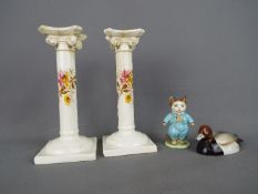 A Beswick Peter Scott 'Pochard', a 'Tom Kitten' figurine and a pair of Imperial Bonn candlesticks,