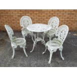 A vintage painted metal garden table and four chairs, table approximately 70 cm (h) and 68 cm (d).