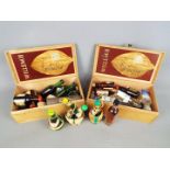 A collection of various miniature / taster bottles of alcoholic drink to include whisky, gin,