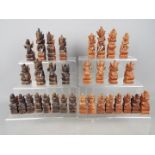 Chess Set - A carved wood chess set, king approximately 10.