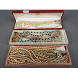 A mixed lot of costume jewellery to include five sets of various pearl necklaces,