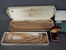 A mixed lot of costume jewellery to include double stranded Lotus pearl necklace,