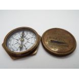 A brass compass