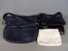 Handbags - a Smith & Canova cream leather handbag, Golunski black leather purse,