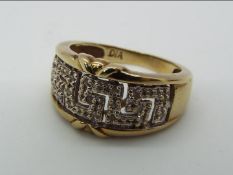 9 ct Gold - a 9 ct gold ring set with diamonds, stamped 375 DIA, size L, approx 3.