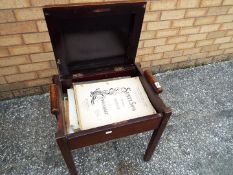 An Art Deco mahogany music stool,