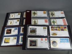 Philately - Four binders containing first day covers including numerous Benham silk covers